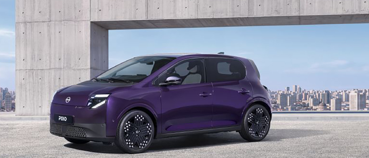 Nissan PIXO 2027 de face avec vue sur la ville